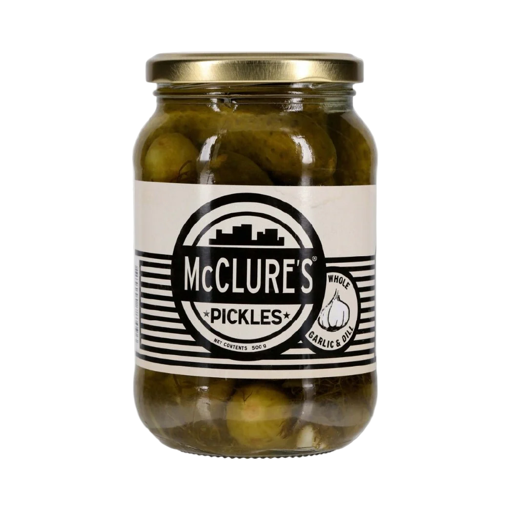 Jar of McClure's pickles with a white label on a white background