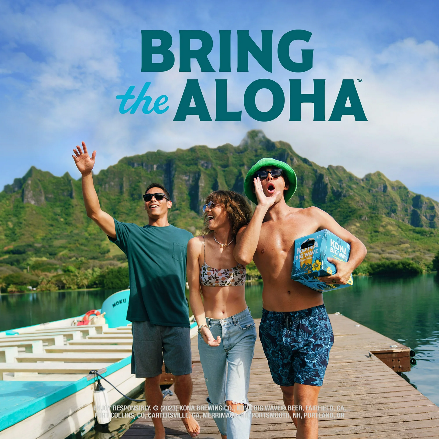 Three people on a dock with mountains and water in the background, promoting 'Kona Big Wave'.
