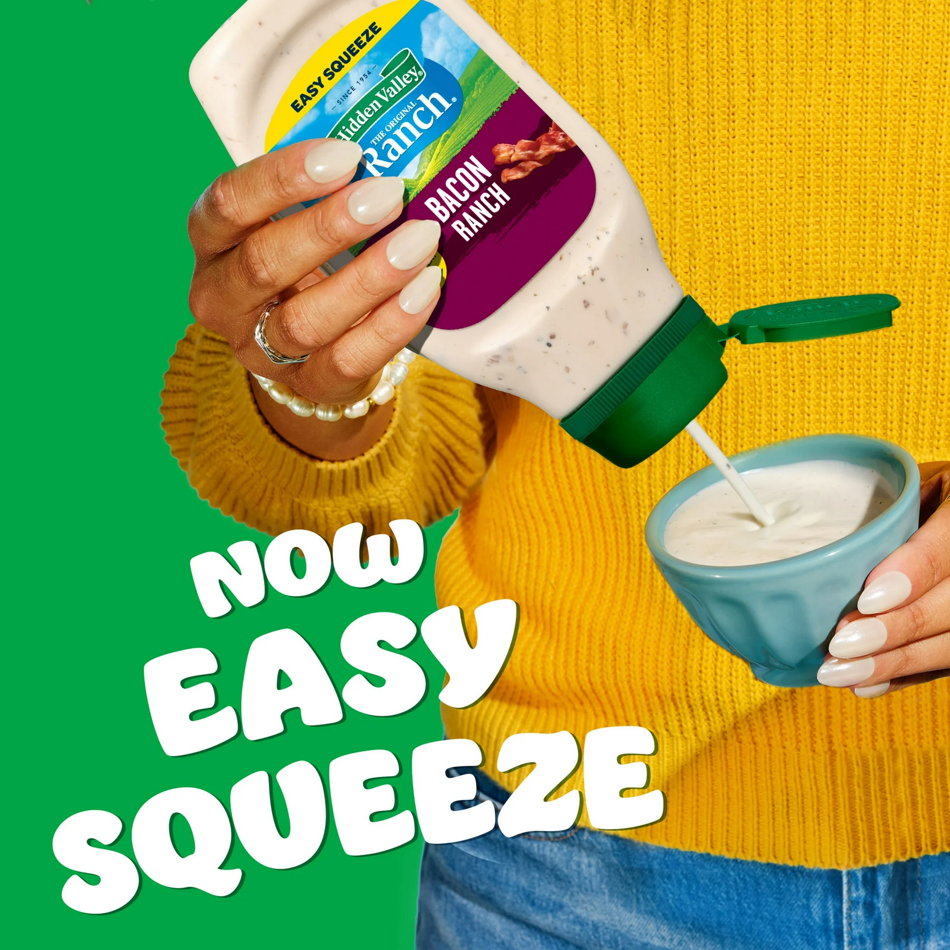 Person pouring Hidden Valley Ranch dressing into a bowl with text 'Now Easy Squeeze'.
