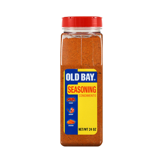 Old Bay seasoning container with red lid on a white background