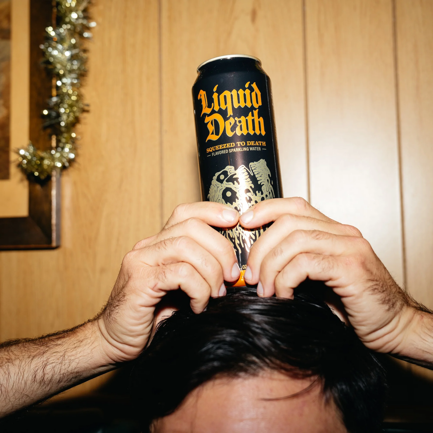 Liquid Death Squeezed to Death, Orange Flavored Sparkling Water – 568 mL