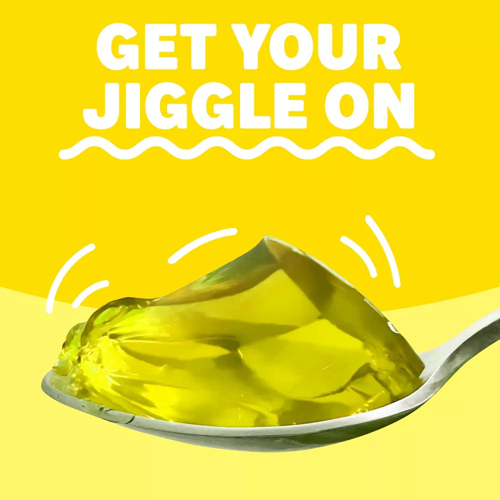 Spoonful of yellow gelatin with 'Get Your Jiggle On' text on a yellow background
